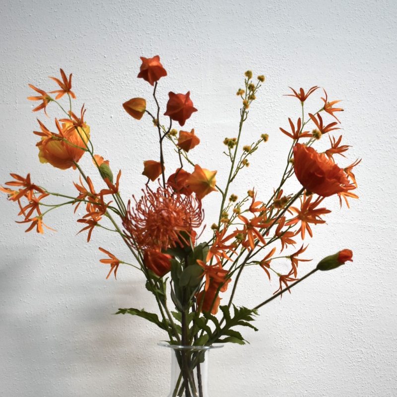 Vrolijk,oranje,kunstbloemen boeket