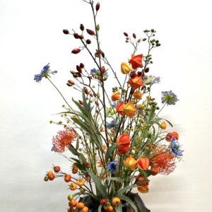 Kleurige kunstboeket in Cactusvaas