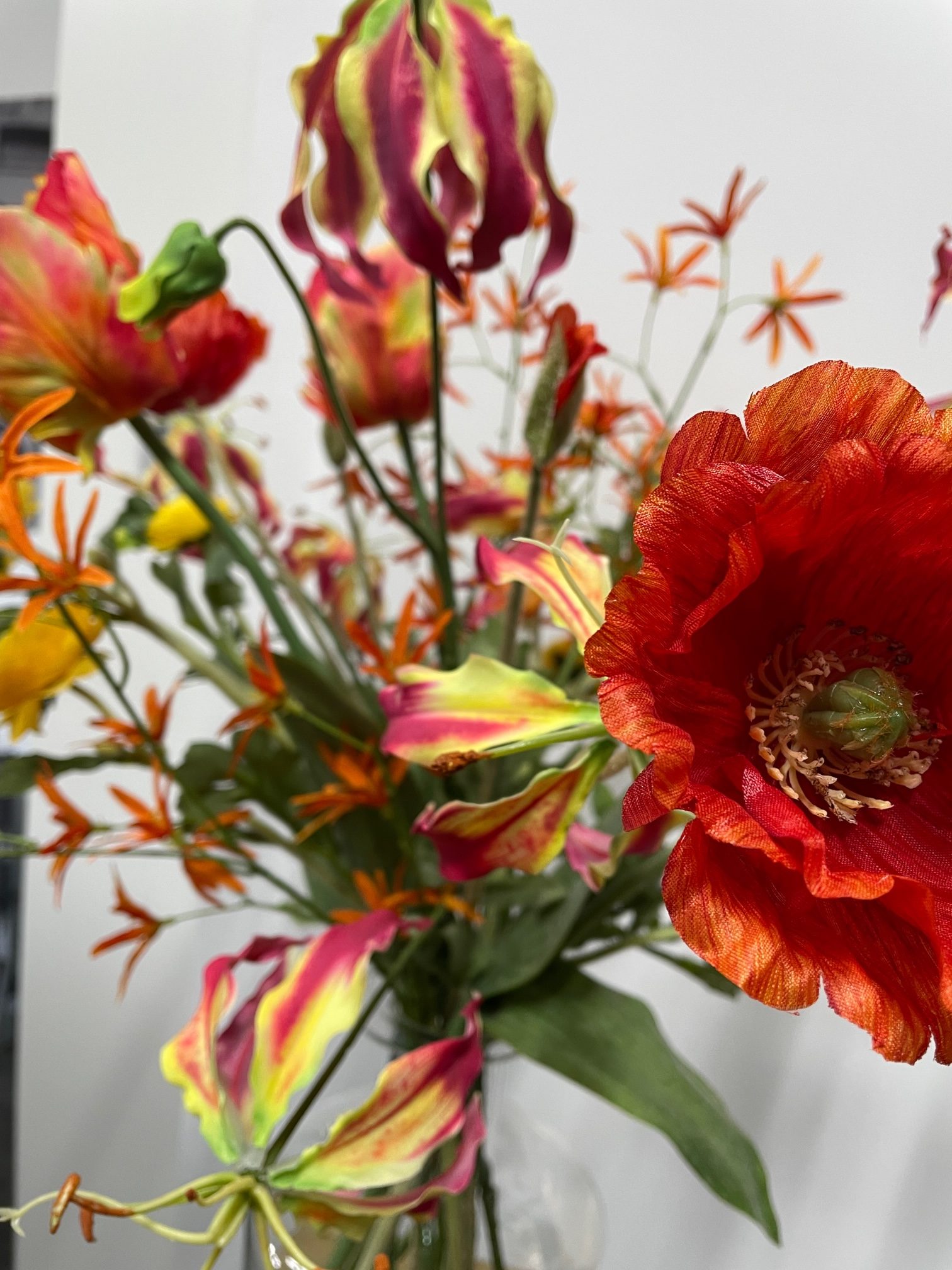Oranje/geel kunstbloemen boeket